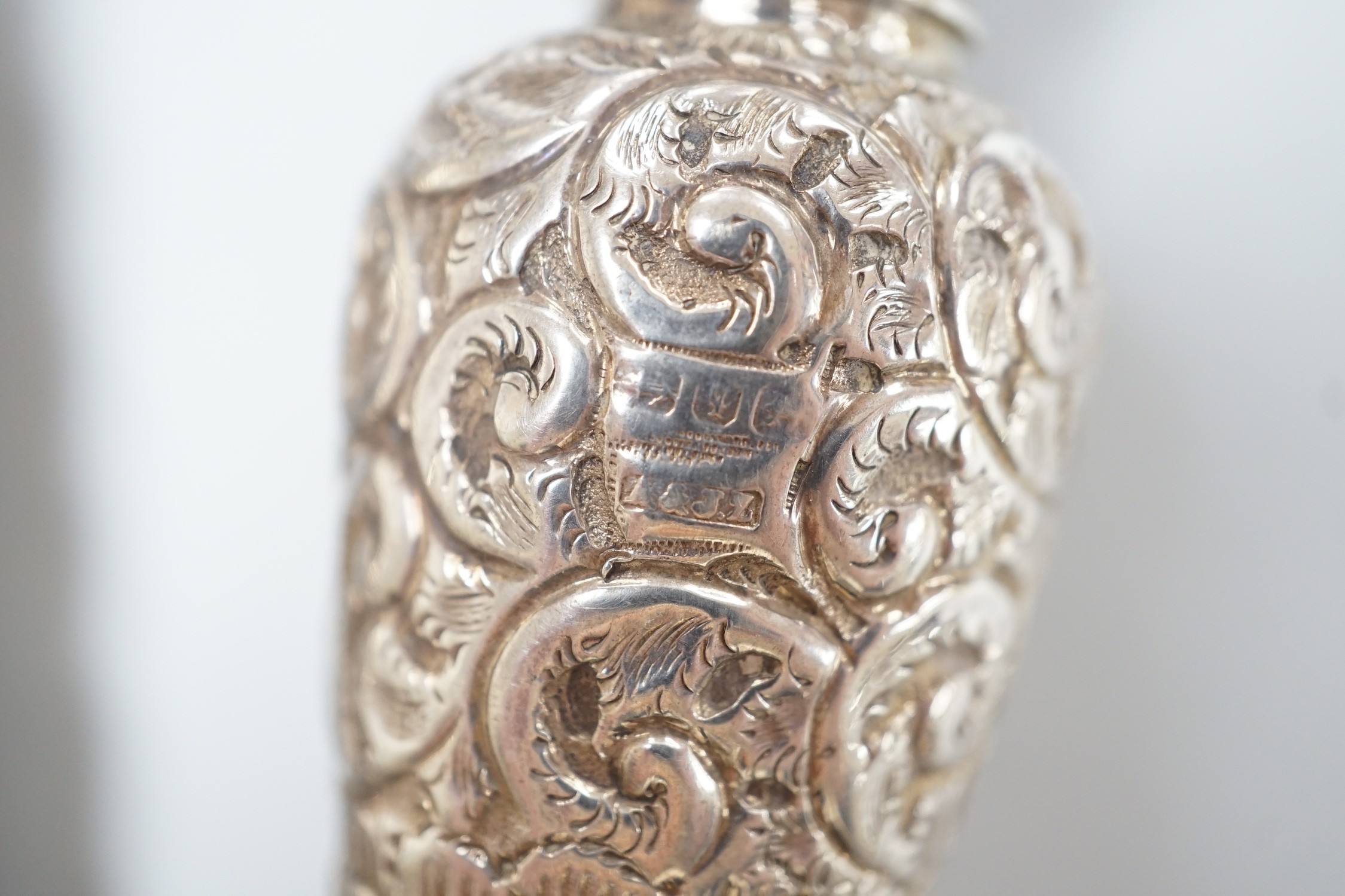 Two late Victorian silver teardrop shaped scent bottles, the largest by Horton & Allday, 15.6cm.